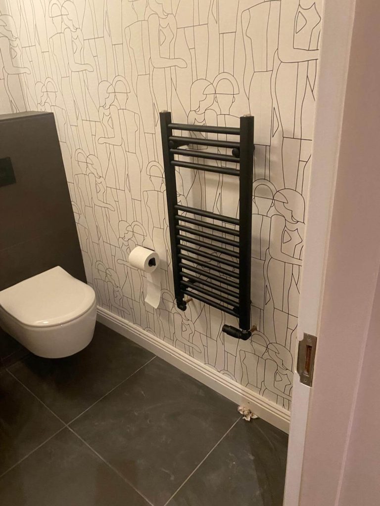 New radiator in bathroom